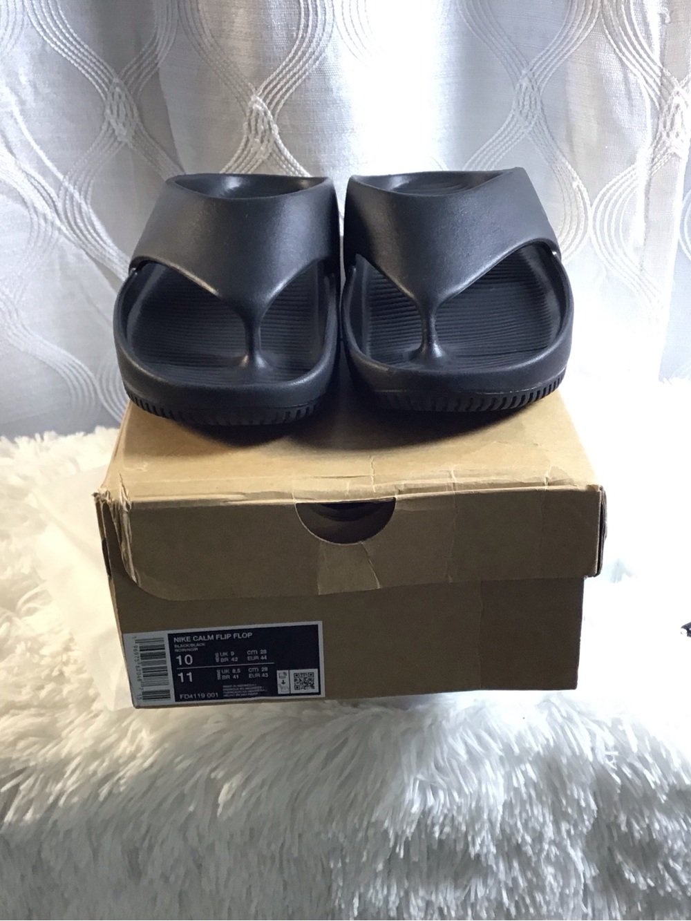 Nike Black Men’s Slip-On Foam Flip Flops